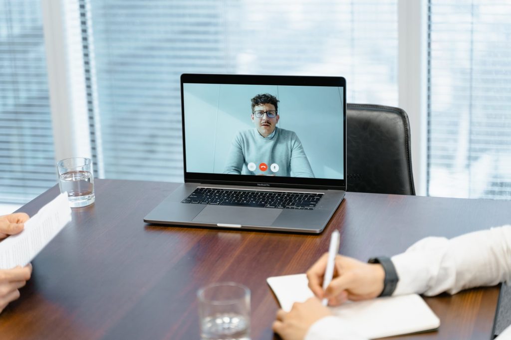 a businessman in an online meeting